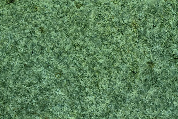 녹색 화강암 바위 근접 촬영 배경, 돌 텍스처, 표면에 금이 — 스톡 사진