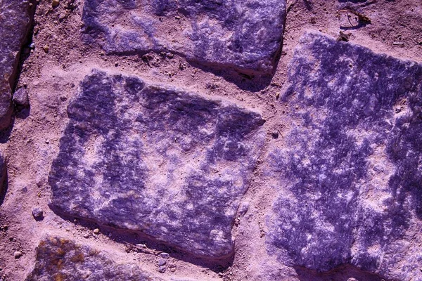 Purple Street pavement background, rock texture