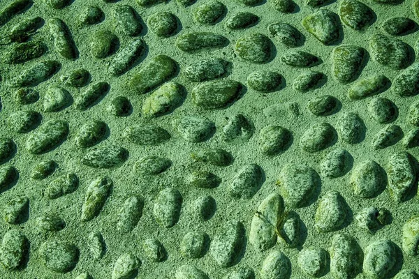 Verde Bonita imagen de fondo de guijarros, rocas redondas textura — Foto de Stock