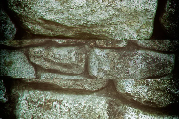 Steinmauer für Hintergrund oder Felsen raue Textur — Stockfoto