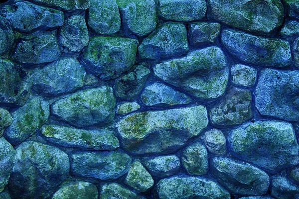 Blaue Steinmauer für Hintergrund oder Felsen raue Textur — Stockfoto