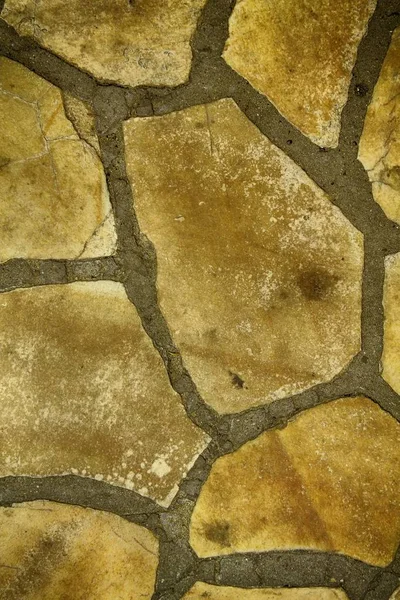Оранжевый фон каменной стены. Каменный пол, текстура — стоковое фото