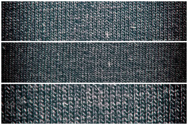 Latar belakang gelap dari bahan tekstil dengan wicker, tekstur kain close-up — Stok Foto