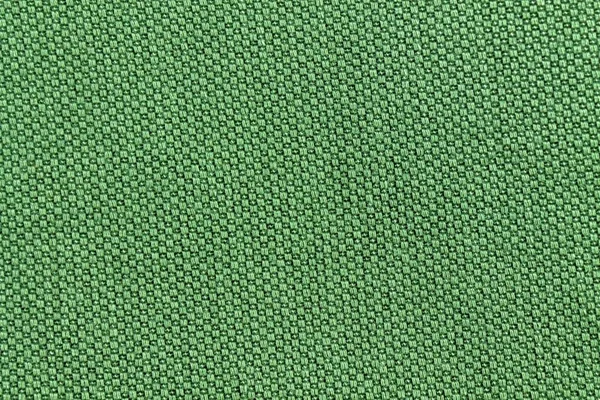 Green jeans denim texture for background or design.