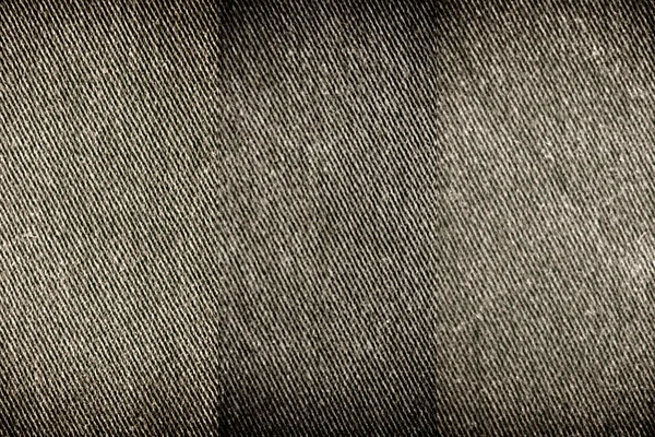 Closeup detalhado de denim grungy em branco. Jeans cinza escuro vintage, bom para fundo . — Fotografia de Stock