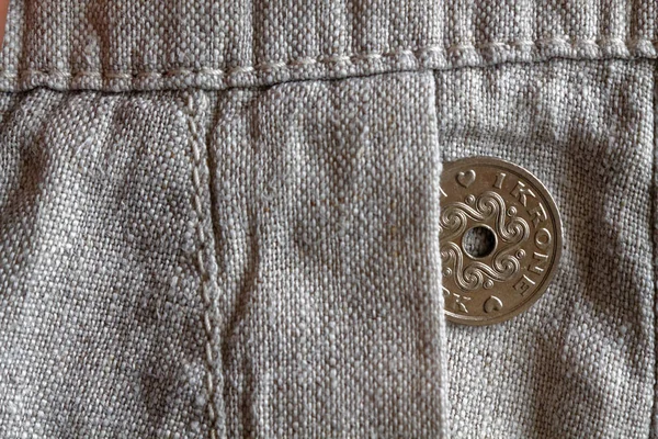 Denmark coin denomination is 1 krone (crown) in the pocket of old linen pants