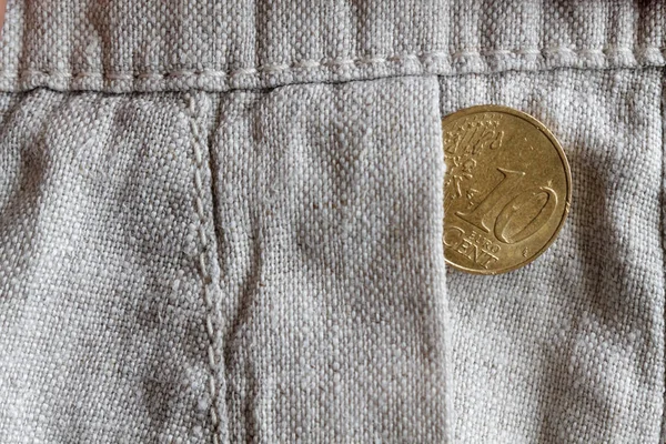 Euromunten met een nominale waarde van 10 euro cent in de zak van oude linnen broek — Stockfoto