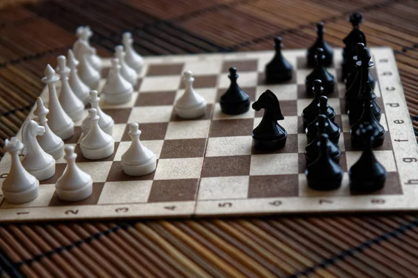 Wooden chess Board and plastic chess pieces, on board — Stock Photo, Image