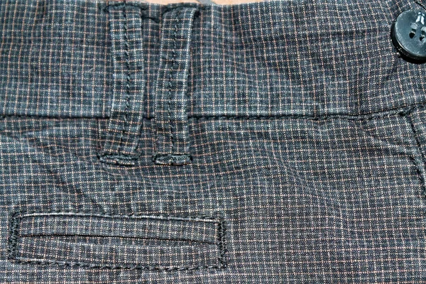 Výstřední džínoviny čtverce s tlačítky. Vintage tmavě šedé džíny, dobré pro pozadí — Stock fotografie
