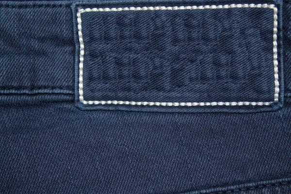 Texture denim étiquette vide pour le fond traditionnel de l'entreprise — Photo