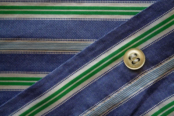 Part of blue - green striped shirt with buttons texture or background — Stock Photo, Image