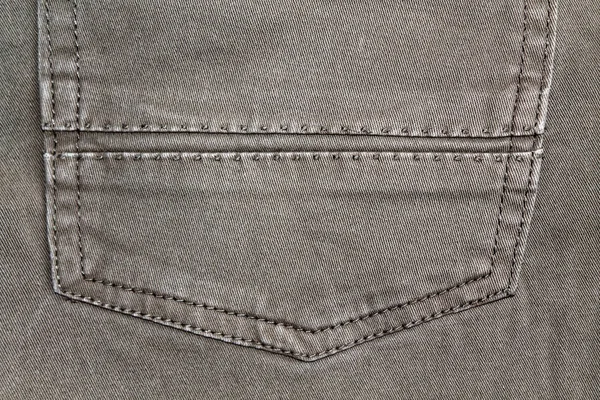 Gros plan de denim beige blanc. Jeans vintage obsolètes avec des lacets, bon pour le fond — Photo