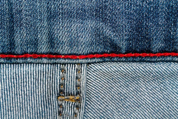 Denim texture with red seam for jeans background — Stock Photo, Image