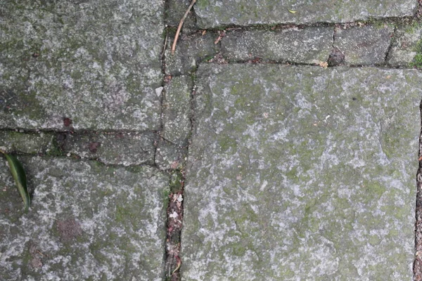 Parede de pedra elegante de pequenas partes quadradas. Textura rock — Fotografia de Stock