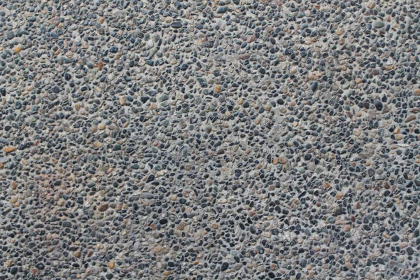Підлога з кам'яної текстури. Рожевий сірий рок фон — стокове фото