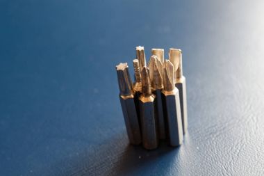 Tornavida (BITS) üzerinde mavi arka plan, araçları koleksiyonu dönüş-vida için baş