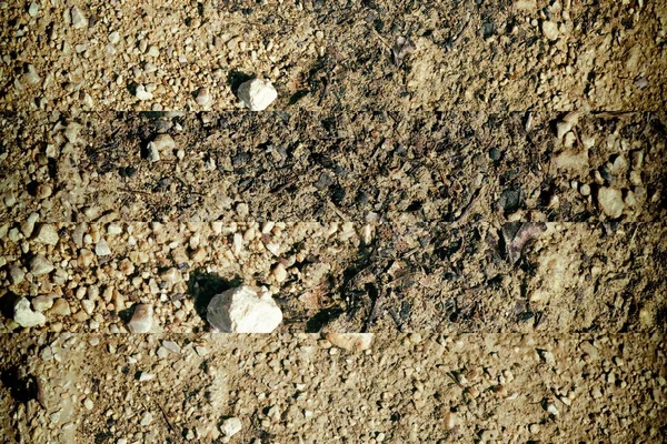 Bodenstruktur wie auf dem Mars, Sandoberfläche, Steinhintergrund — Stockfoto