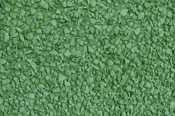 Surface texturée de galets ultra verts, toile de fond en pierre et fond de rocher — Photo