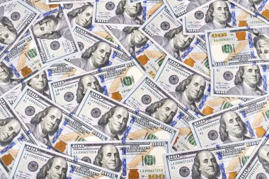 Birçok yeni tasarımın arka planında Amerika Birleşik Devletleri 'ne ait 100 Amerikan doları para birimi var. ABD banknotları ekonomi, finans, enflasyon ve yatırım kavramı olarak yığınla