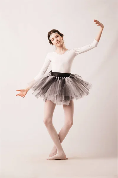 Girl dancing ballet with white background in light clothing — Stock Photo, Image