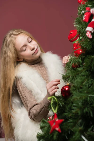 Beautiful Christmas Girl Hugging Toy Sitting White Chair Fireplace Christmas — Stock Photo, Image