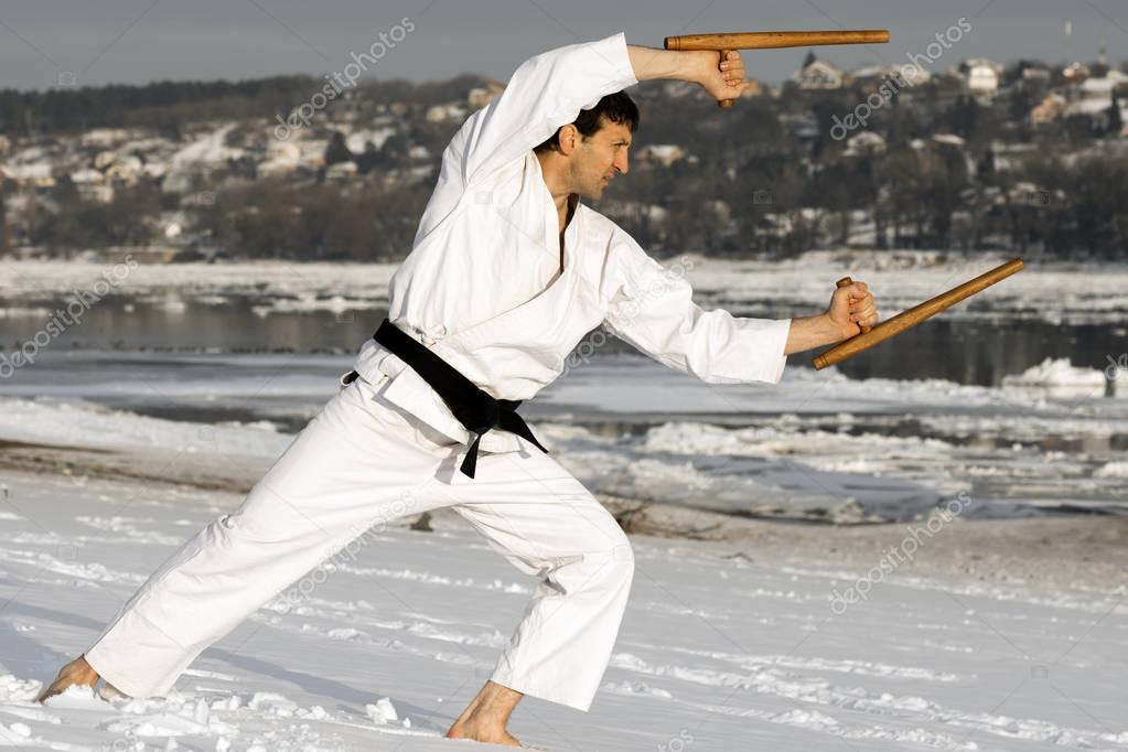 ninja with tonfa in snow