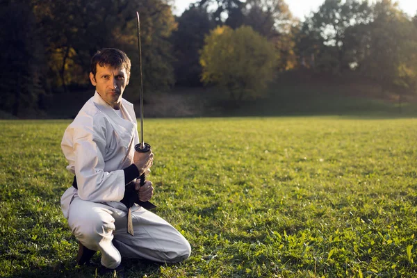 White ninja with sword — Stock Photo, Image