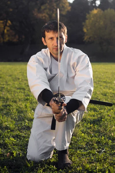 White ninja with sword — Stock Photo, Image