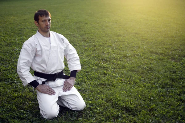 Sitting white ninja — Stock Photo, Image