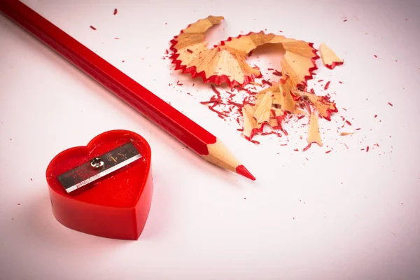 Red sharpener and pencil — Stock Photo, Image