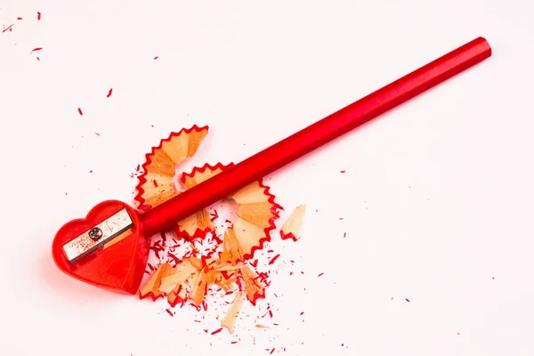 Red sharpener and pencil — Stock Photo, Image