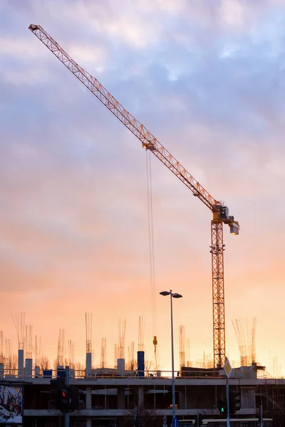 building with crane construction industry
