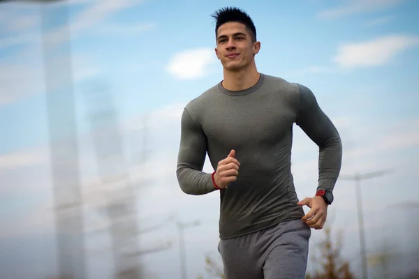 Jogging sporty young man — Stock Photo, Image