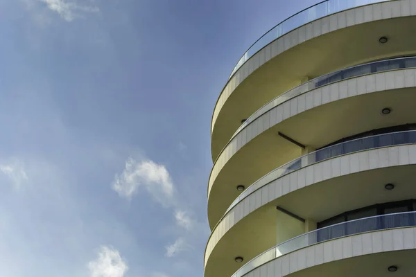 modern curved hotel building closeup i