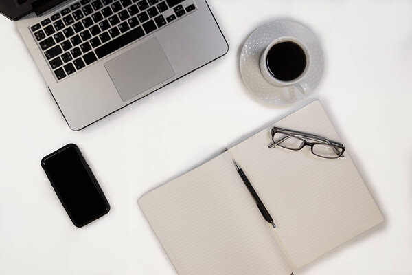 set of notebook,Notepad, pens, glasses and other gadgets for wor