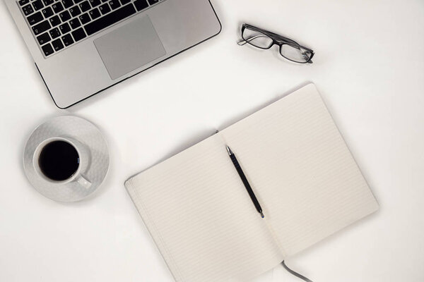 set of notebook,Notepad, pens, glasses and other gadgets for wor