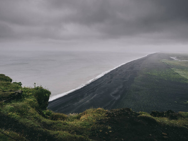 scenic view of black sand beach from cliff, Vik, Iceland