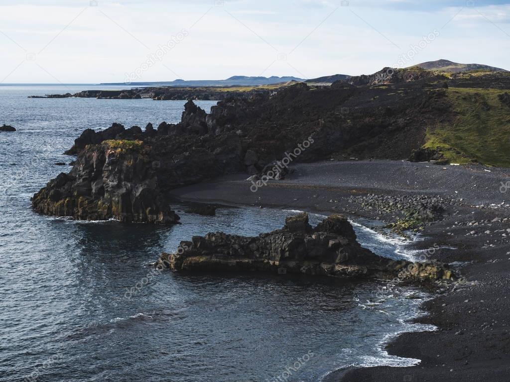 scenic view of coastline with dark cliffs, Dritvik Djupalonssandur, Iceland