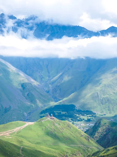 Mountains and church — Stock Photo, Image