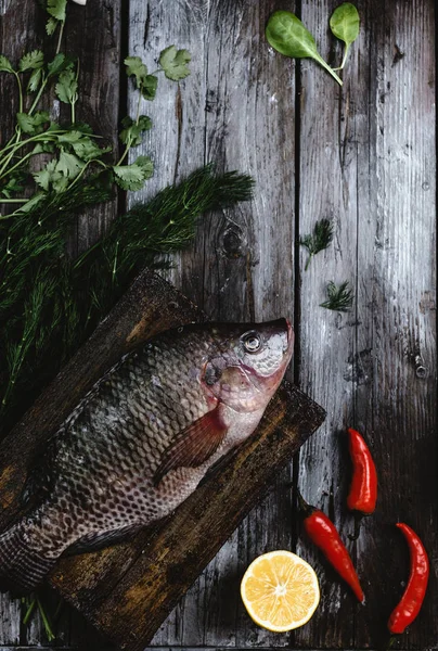 Top View Fresh Raw Sea Fish Herbs Chili Peppers Rustic — Stock Photo, Image