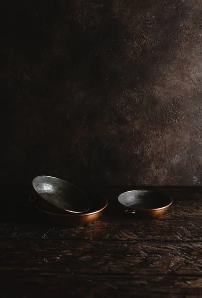 Close-up view of empty vintage utensils on rustic wooden table — Stock Photo