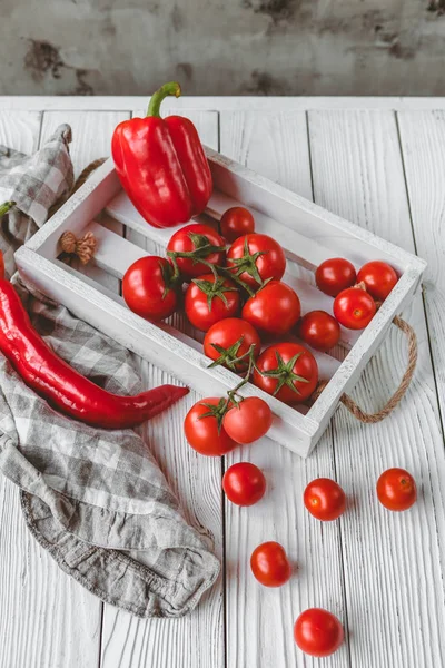 Cherry tomatoes and peppers — Stock Photo