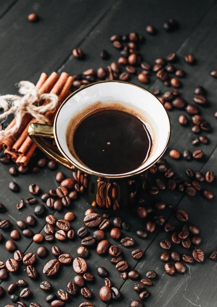 Cup Black Coffee Coffee Beans Cinnamon Sticks Dark Background — Stock Photo, Image