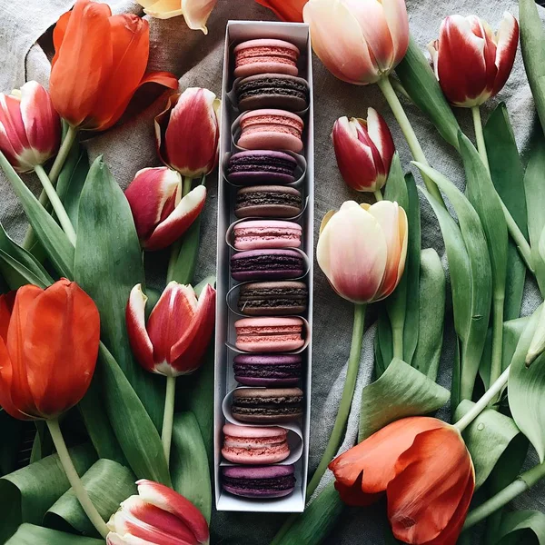 Sweet colorful Macarons in box on table