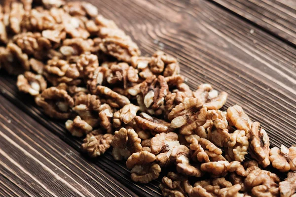 Pile Shelled Walnuts Wooden Background Healthy Eating Concept — Stock Photo, Image