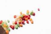 pile of sweet colorful candied fruits isolated on white background 
