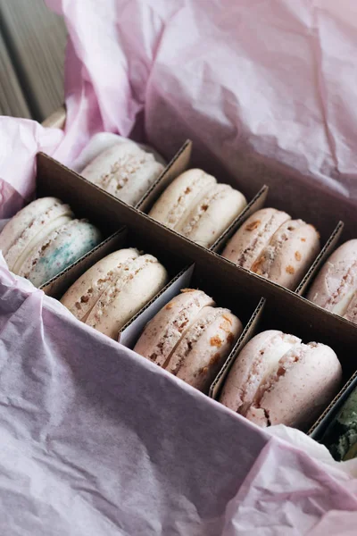 delicious colorful macaroons in paper box, sweet dessert