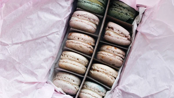 delicious colorful macaroons in paper box, sweet dessert