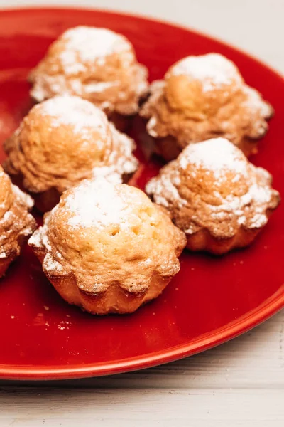 delicious sweet cupcakes on red plate, delicious homemade dessert