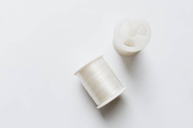  beyaz dikiş iplikleri arka plan closeup 